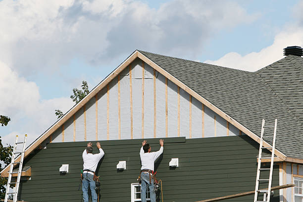 Professional Siding technician working in Coulters, PA